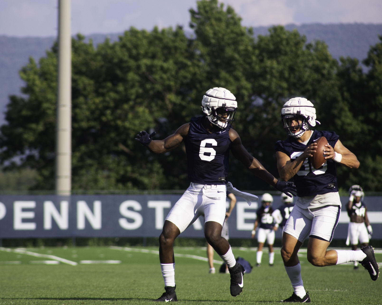 Football Media Day, Brown (6) and Johnson (36) practicing